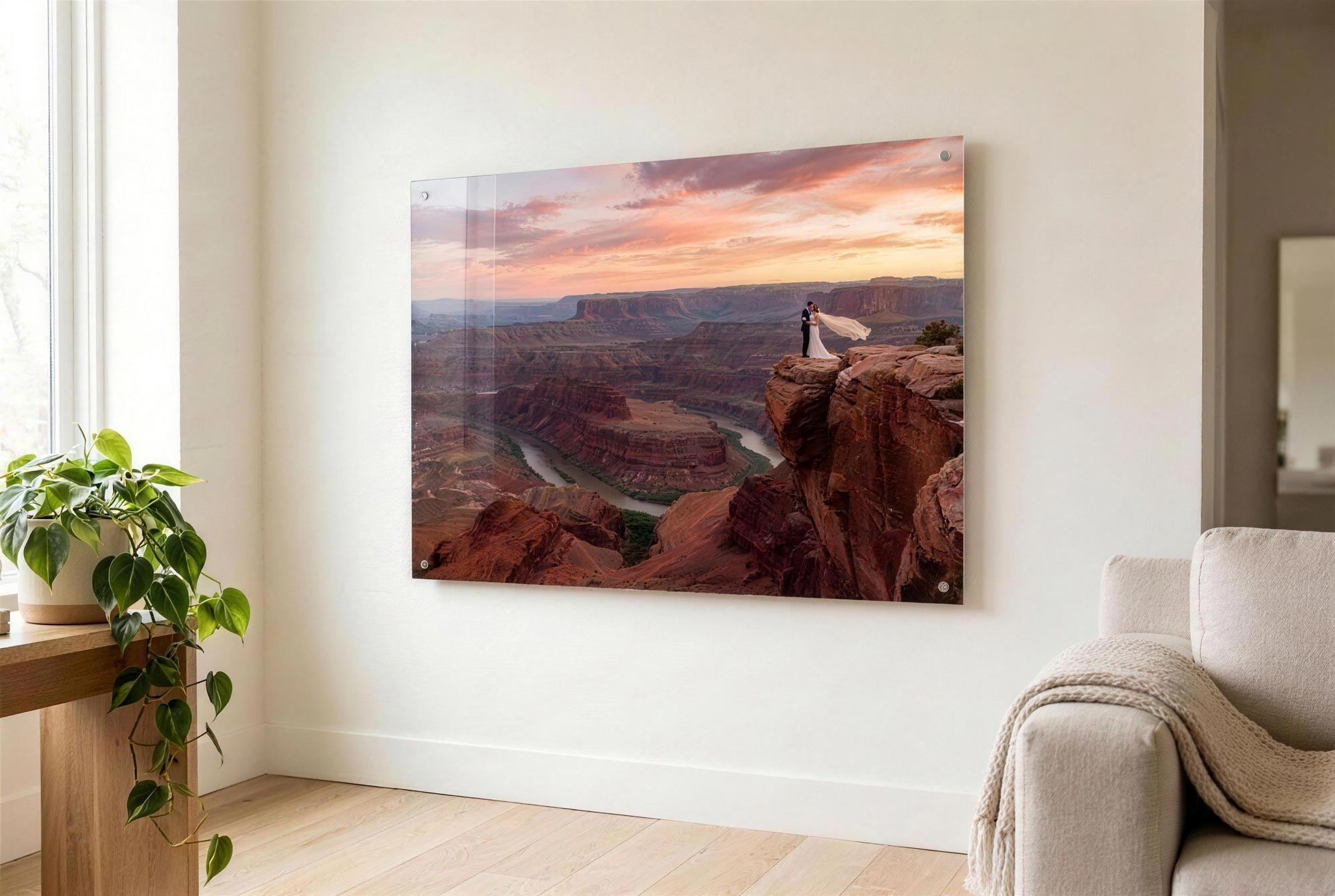 Acrylic print seen at an angle on a wall, showing its glossy face and thin edge