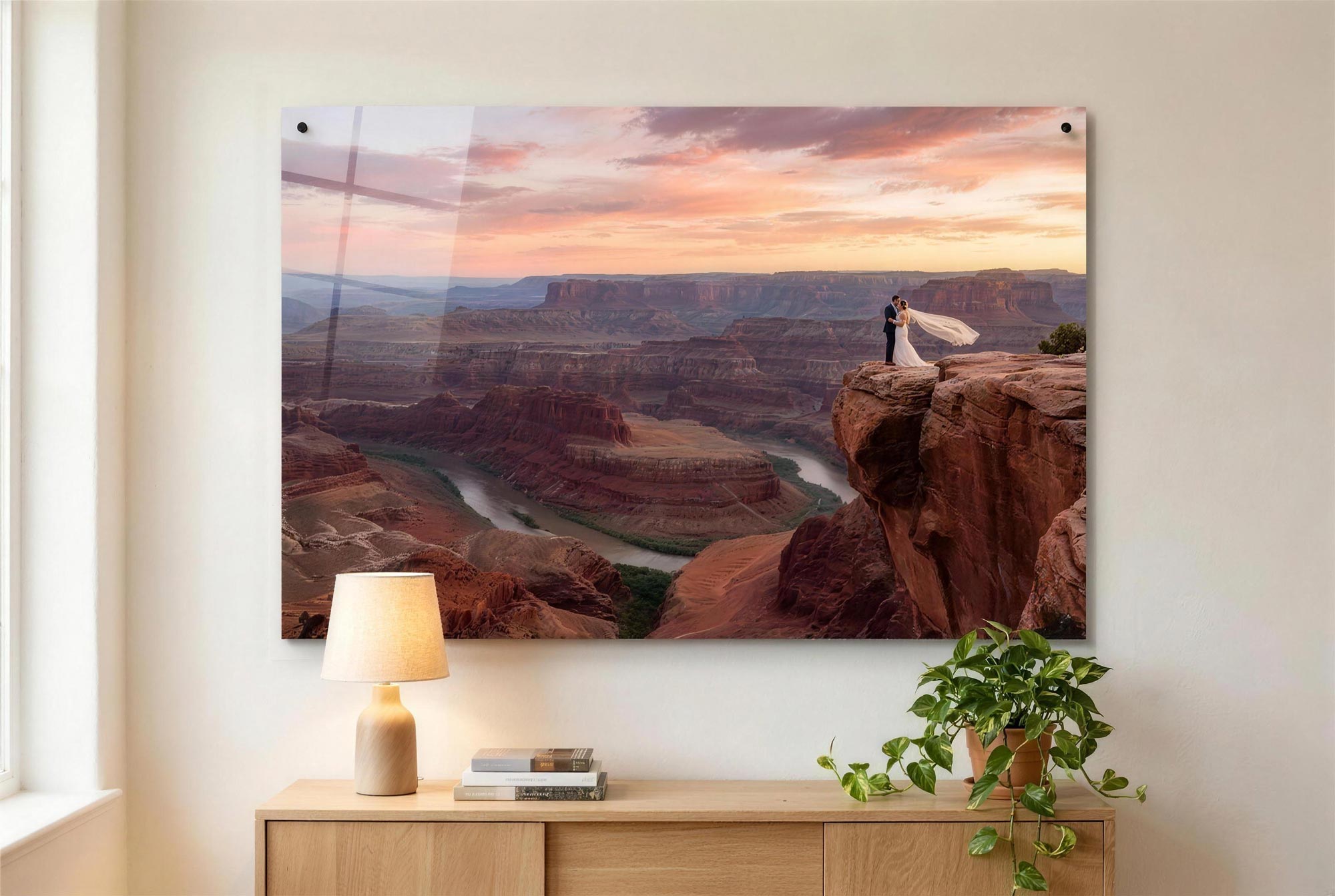 Large acrylic print hanging above a console table in a living room